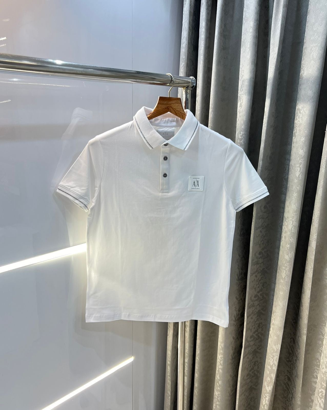 AX. Polo T-Shirt